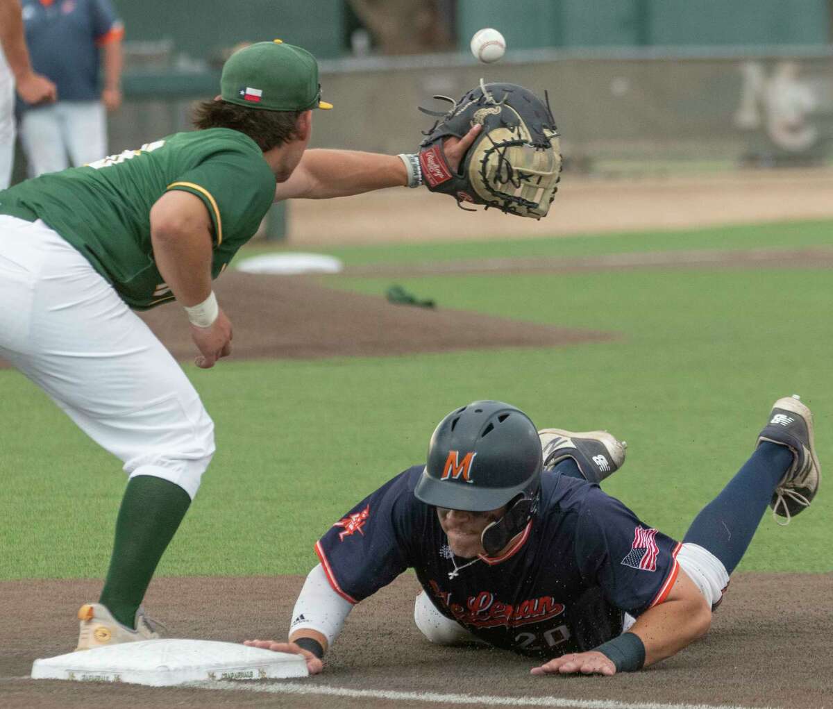 Midland College's Gibrian Pena reaches for the pickoff throw as McLennan's Jason Hawkins safely dives back 05/16/2022 during the Region V championship game at Christensen Stadium. Tim Fischer/Reporter-Telegram