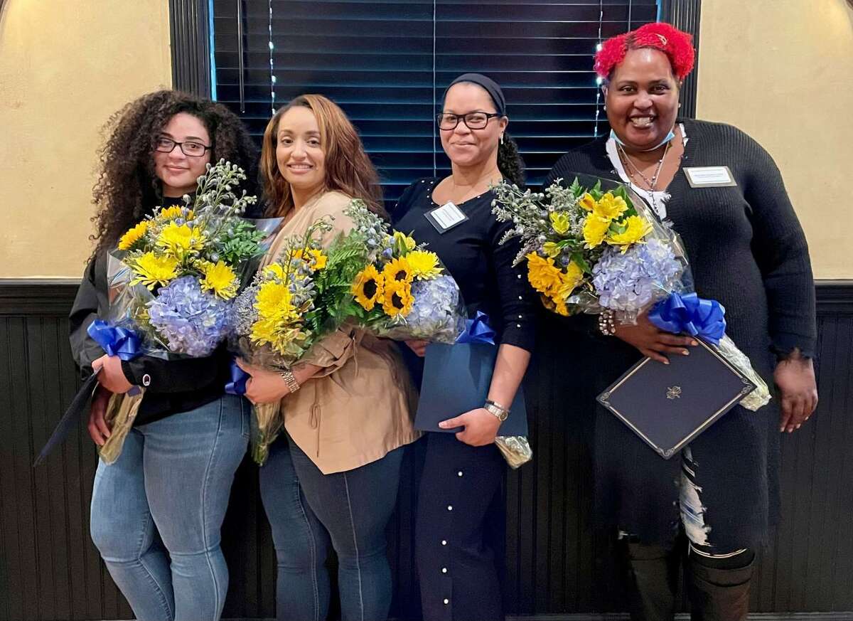 The Network of Executive Women (NEW) awarded scholarships to six women at its recent luncheon. Pictured, left to right, are Kelsey Concepcion, Kristen Miller, Gretchen Ramos-Guadalupe and Heather Taylor-Little.