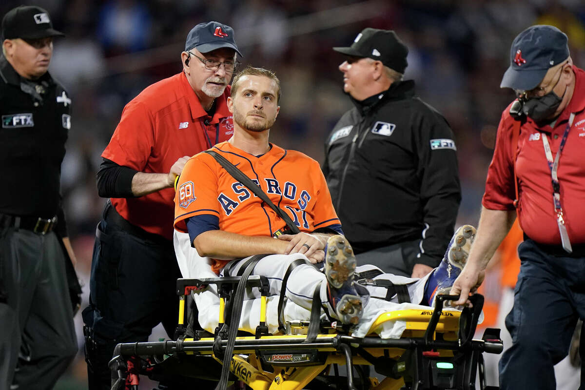 Houston Astros' Jake Odorizzi (17) is wheeled off the field after being tended to on the mound after the fifth inning of a baseball game against the Boston Red Sox, Monday, May 16, 2022, in Boston. (AP Photo/Steven Senne)
