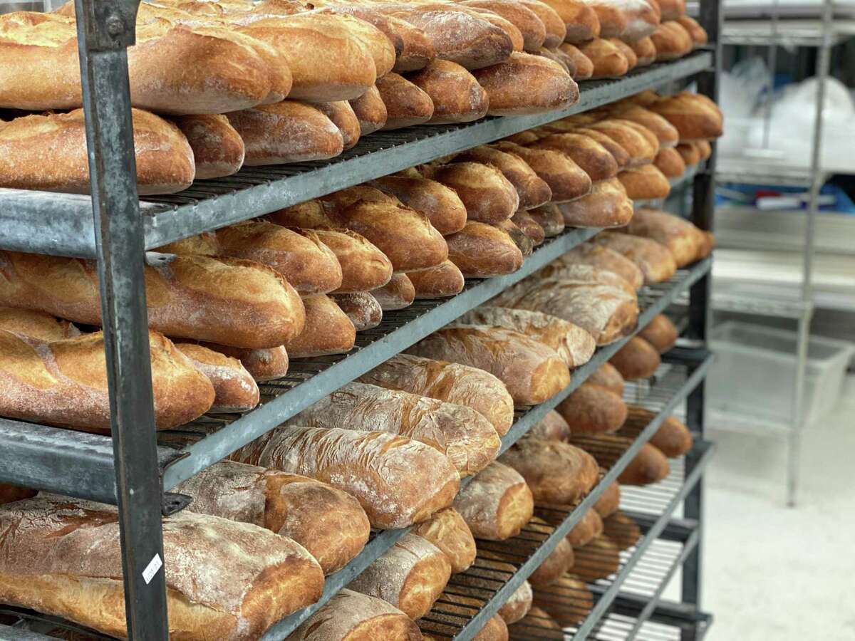 Various fresh breads waiting for packaging and delivery at Bread Man Baking Co.