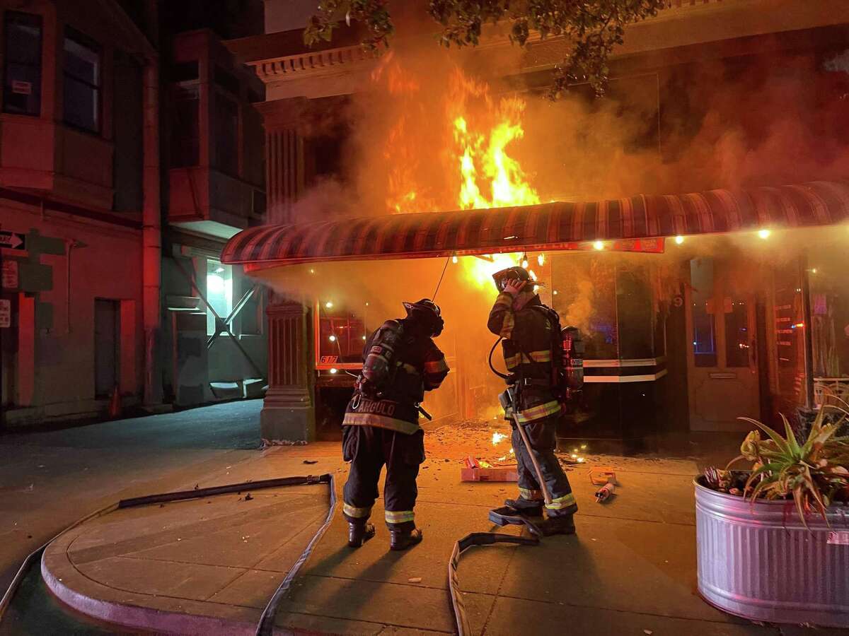 Firefighters battle a blaze that caused significant damage to Anchor Pantry in downtown Vallejo.
