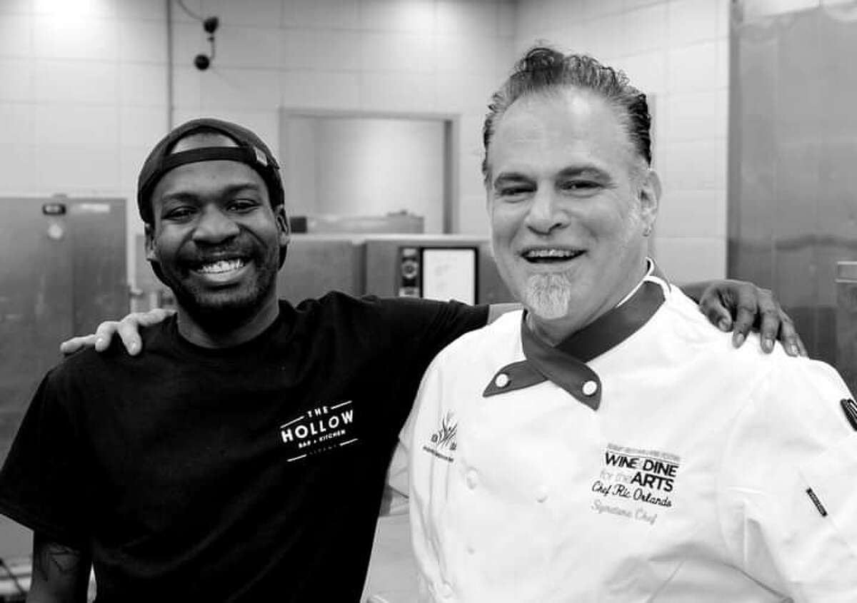 Tyrome Wallace with Chef Ric Orlando. Wallace was named a 2018 Rising Chef as part of the Wine & Dine for the Arts festival, which paired younger chefs with mentors.