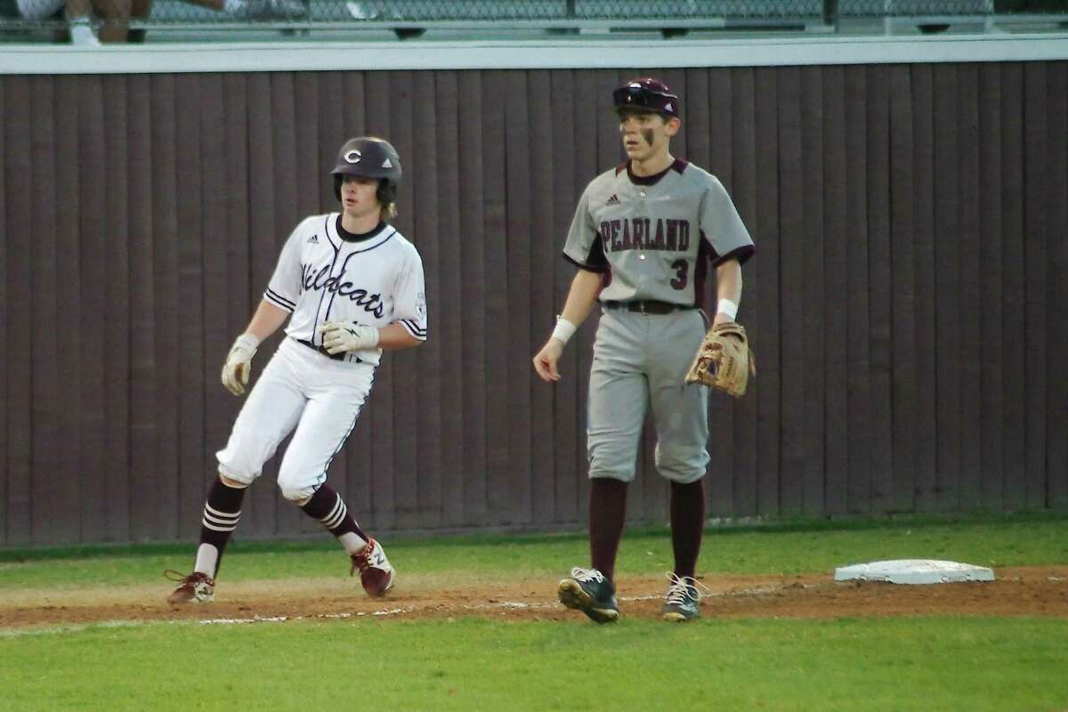 Pearland's Braeden Morse (3) looks for the throw as Clear Creek’s Jackson Babcock (12) rounds third base in a game earlier this season. The Oilers and Wildcats are familiar playoff foes.