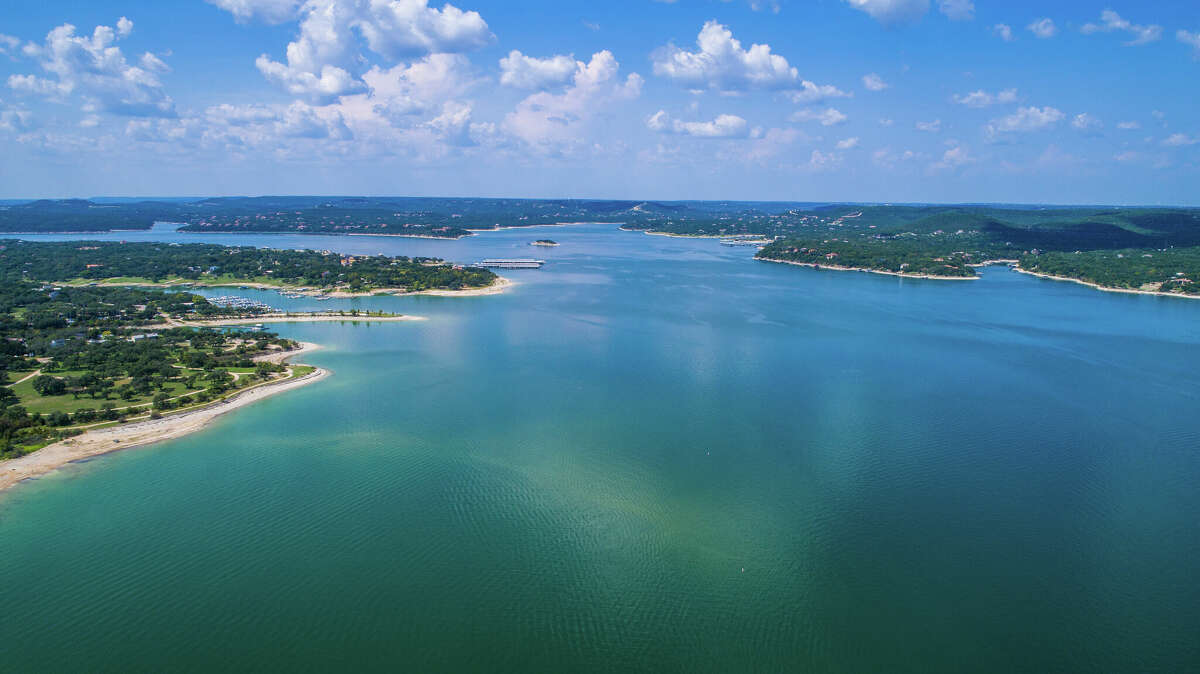 Aerial view of Lake Travis and Lakeway Homes along Water's Edge