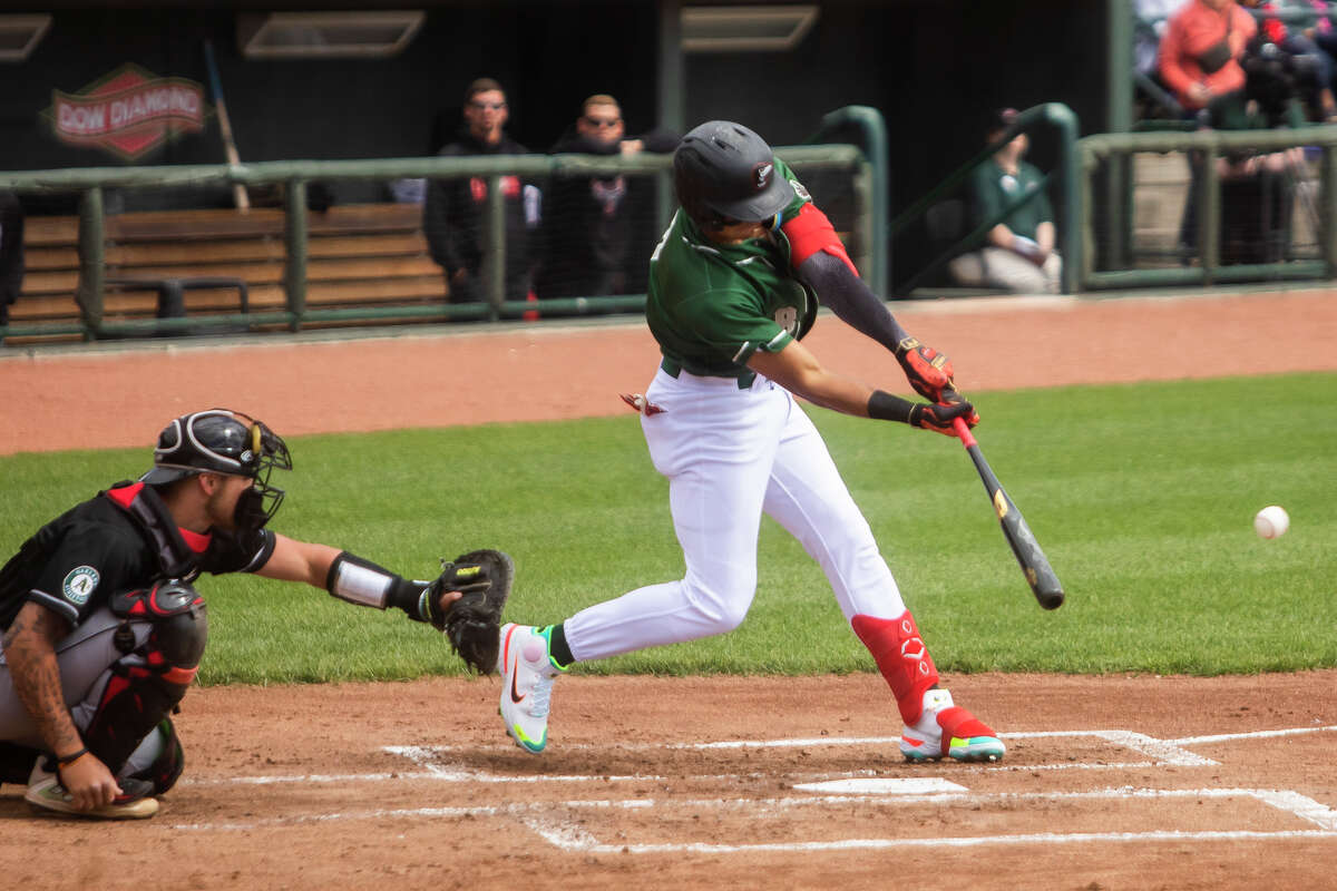 Great Lakes Loons infielder Leonel Valera swings on a pitch during a game against the Lansing Lugnuts Tuesday, May 17, 2022 at Dow Diamond.