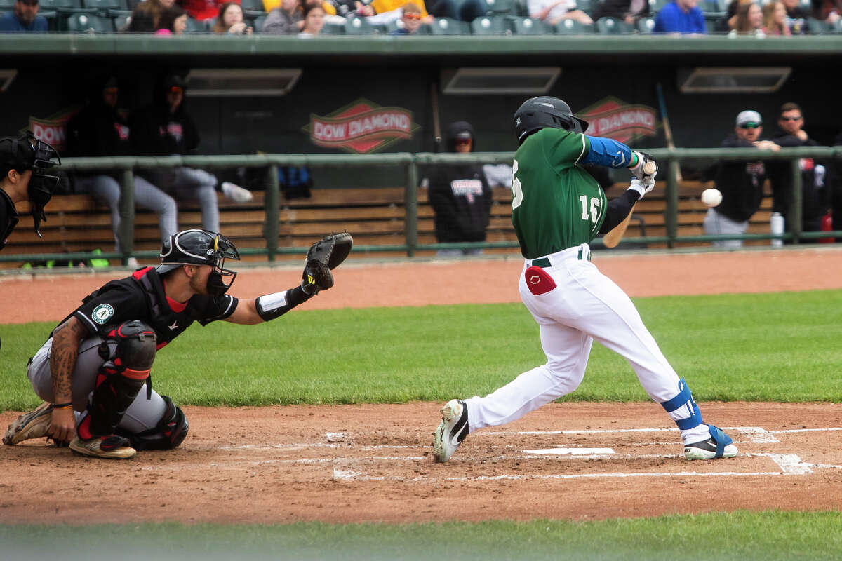 Great Lakes Loons outfielder Edwin Mateo swings on a pitch during a game against the Lansing Lugnuts Tuesday, May 17, 2022 at Dow Diamond.