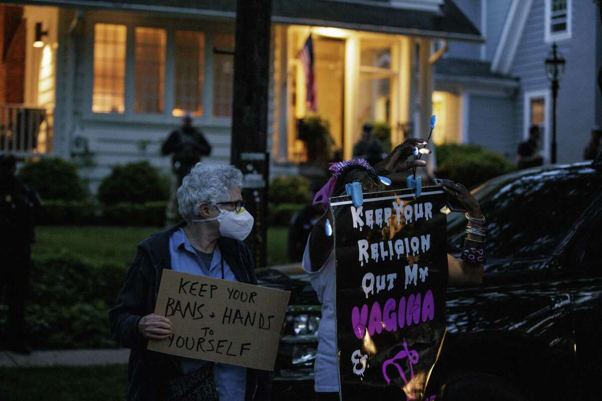 Demonstrators near the home of Supreme Court Justice Brett Kavanaugh in Maryland on May 11. The protests at the homes of conservative justices who may vote to overturn or limit Roe are shameful.