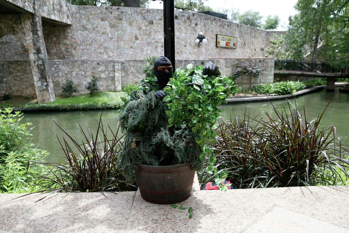 Joe Jones, 33, covers himself in fake ivy to scare people on the River Walk. Known as the Texas Bushman, Jones records the interactions and posts the videos on YouTube and social media. On YouTube alone, Jones's videos have more than 50 million views.