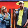 Thumb Brewery co-owner Lauren Formicola and brewer Nick Bowlby take a break in the Caseville brewery's patio area. Thumb Brewery is expanding its brewing capacity.