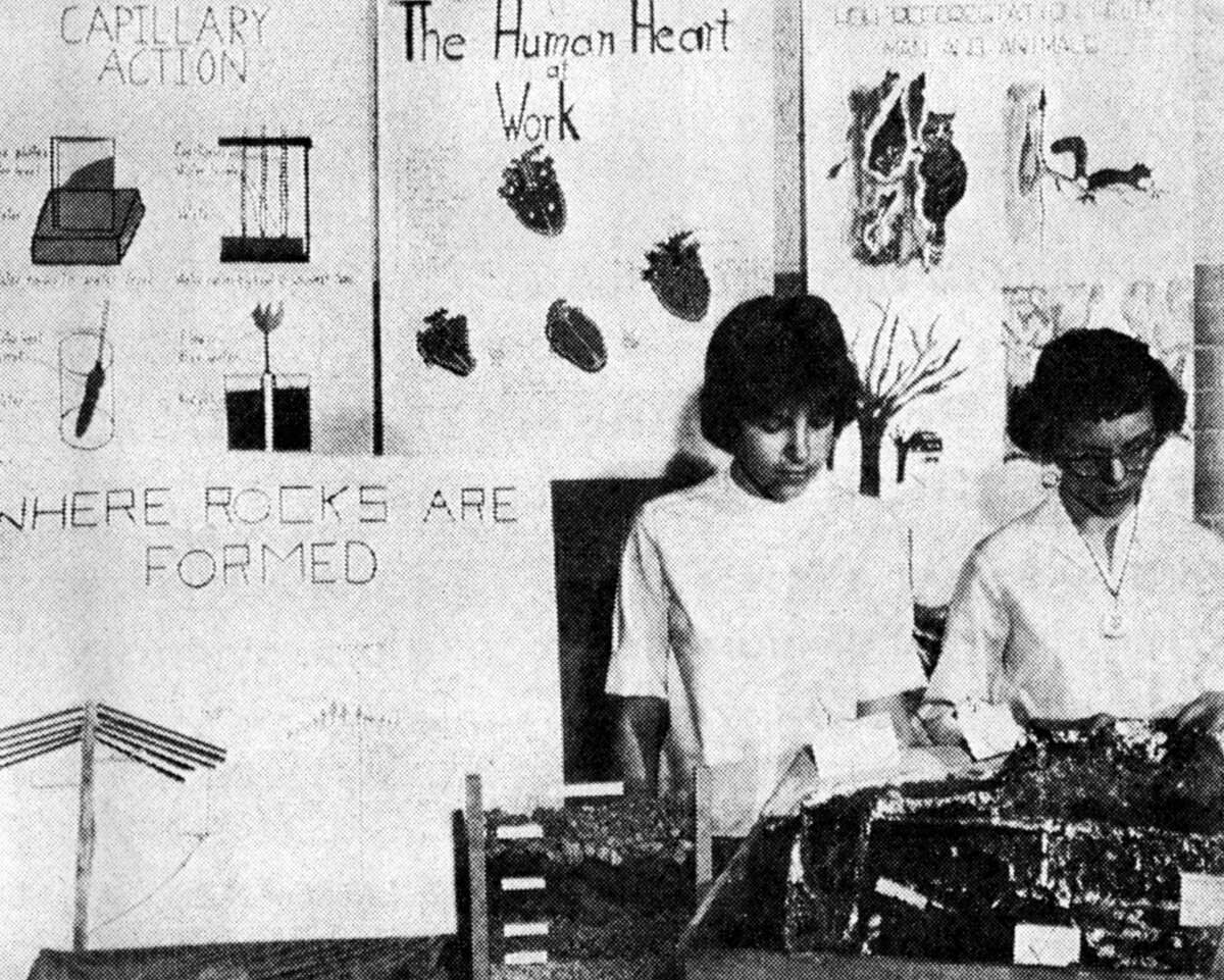 The combined Jefferson and Washington Schools seventh grades hosted a science fair today at the Jefferson School gym. Various science projects are represented by posters, displays and models. Students from both schools can view the science fair and have the science projects explained to them. The photo was published in the News Advocate on May 18, 1962.
