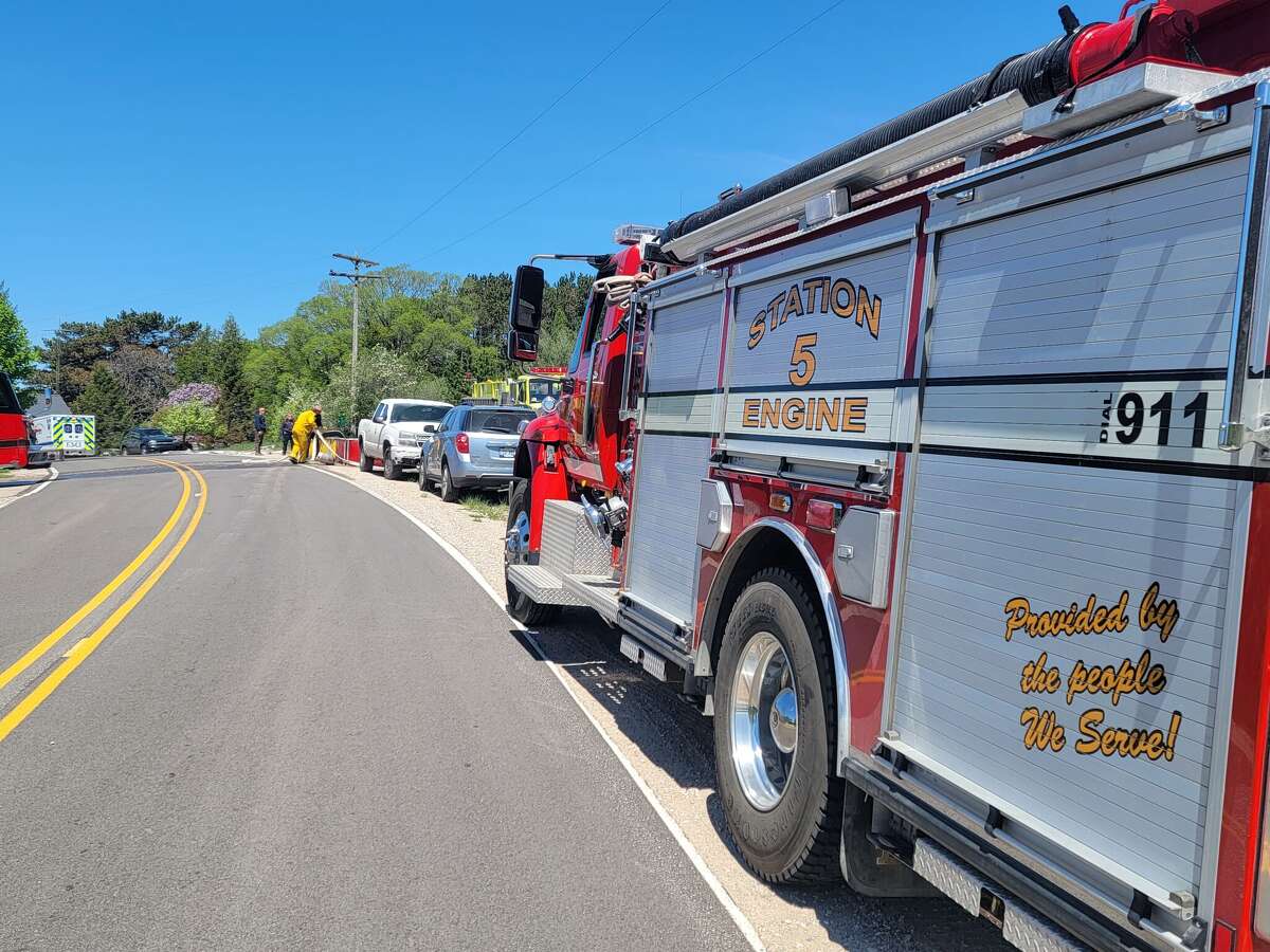 Garage fire on Airport Road started with wildfire, fire chief says