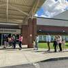 Voters waited in a line that stretched down the hallway at Bethlehem High School, out the door, and to the parking lot. The line was so long that staffers were sent outside to direct in anyone who could not stand for long.