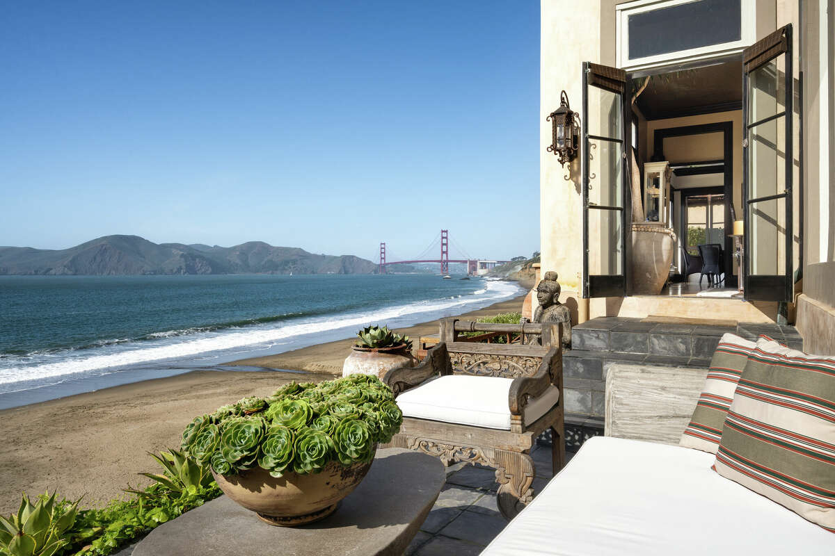 French doors open off the main level to this lounge area.   