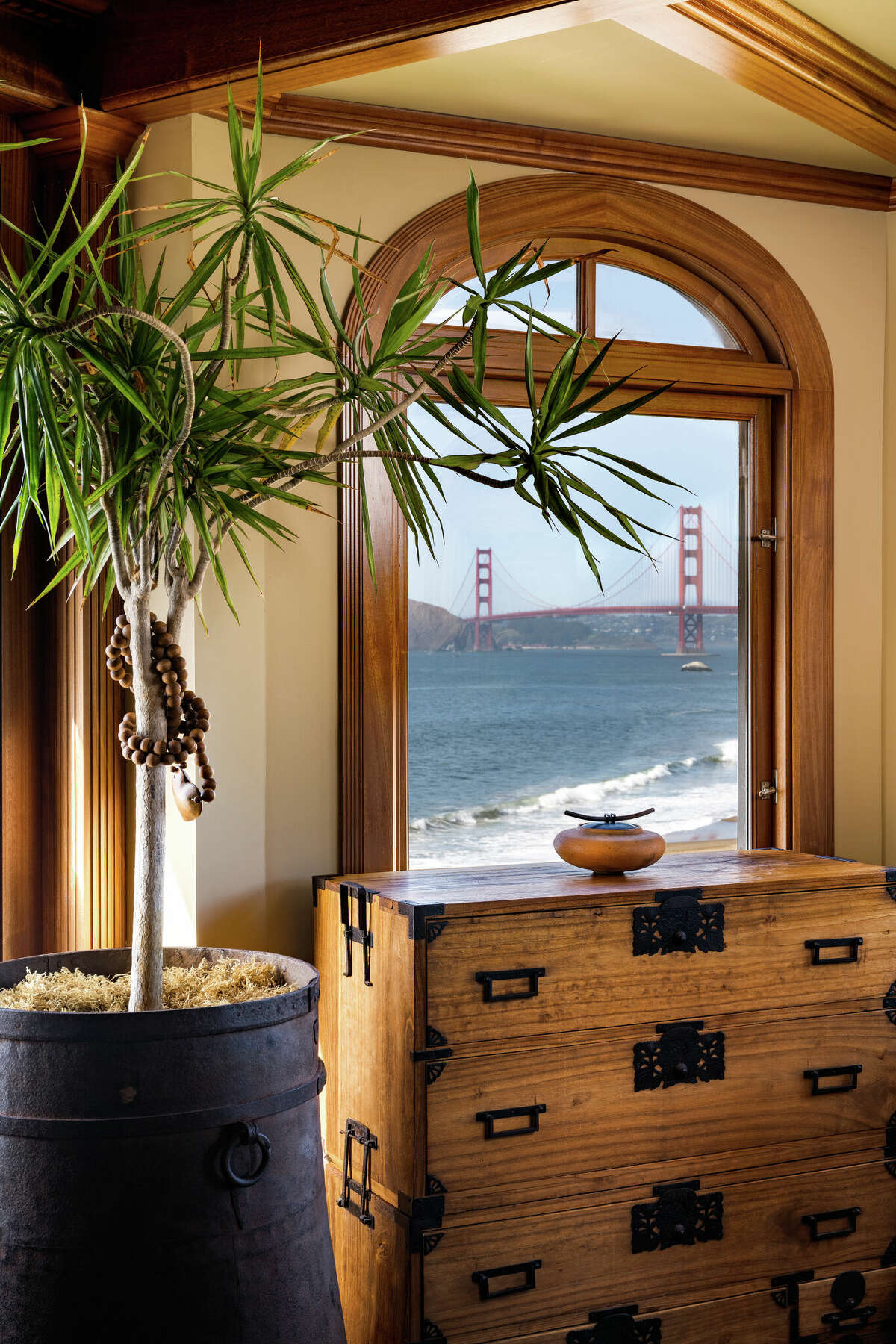 From this window, the Golden Gate Bridge appears in the distance.   