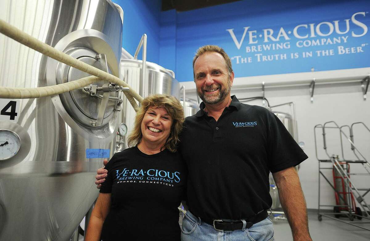 Tess and Mark Szamatulski inside their Veracious Brewing Company brewery in Monroe, Conn. in 2016.