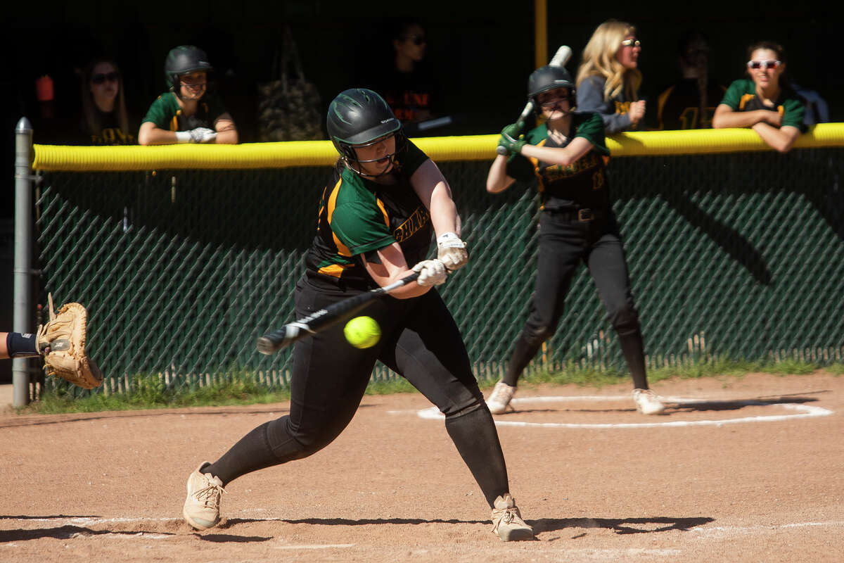 Dow's Isabelle Diehl swings on a pitch during a game against Midland Tuesday, May 17, 2022 at H. H. Dow High School.