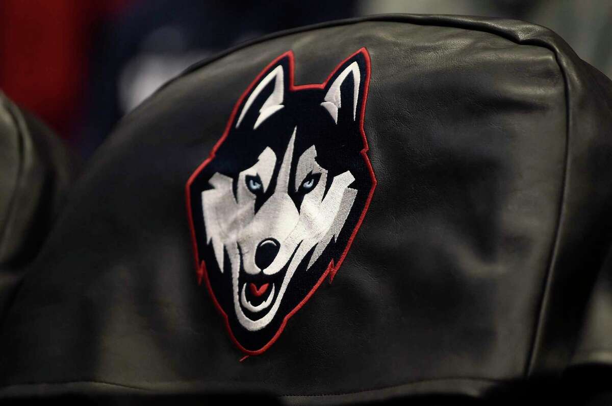HARTFORD, CONNECTICUT - DECEMBER 18: The Connecticut Huskies logo on a chair before the game against the Providence Friars at XL Center on December 18, 2021 in Hartford, Connecticut. (Photo by G Fiume/Getty Images)