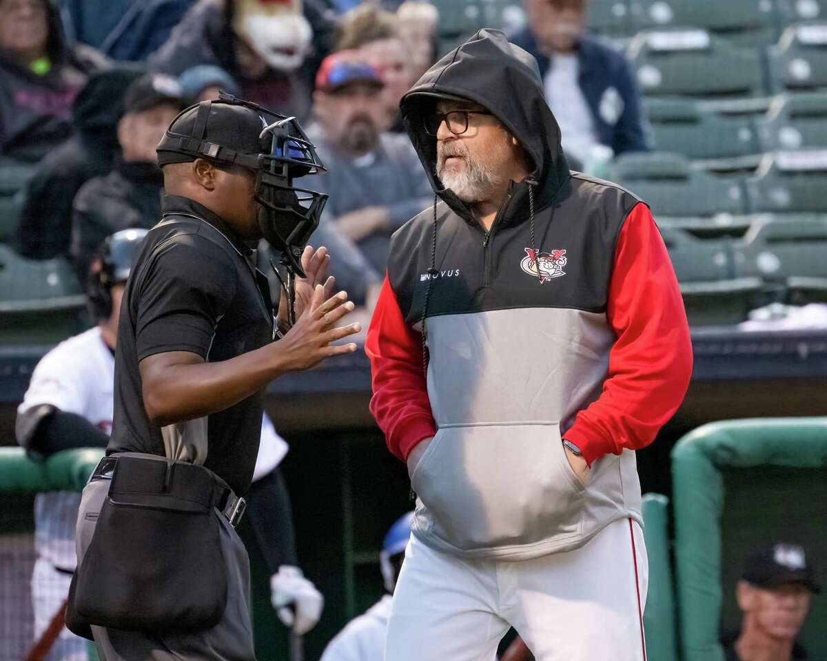 Tri-City ValleyCats manager Pete Incaviglia speaks with the home plate umpire during the home opener against the Lake Erie Crushers at the Joseph L. Bruno stadium on the Hudson Valley Community College campus in Troy, NY, on Tuesday, May 17, 2022. (Jim Franco/Special to the Times Union)