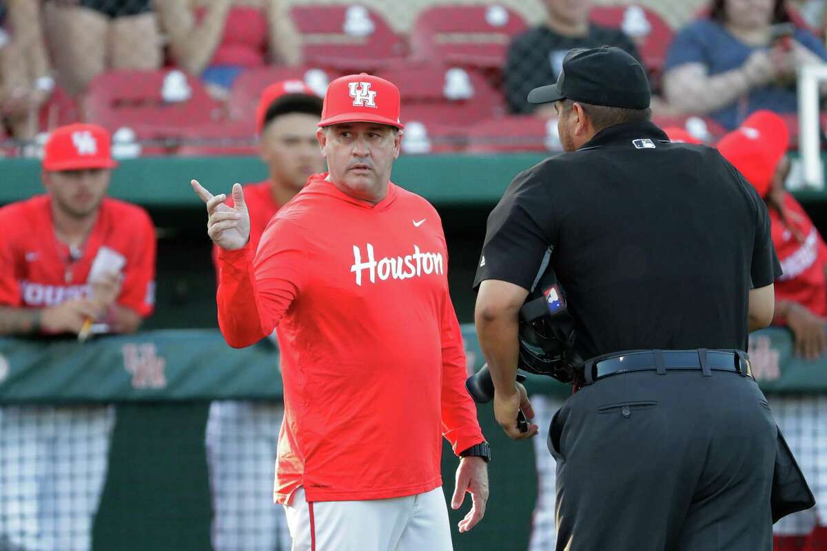 Houston head coach Todd Whitting questions the umpire on an over the fence hit to left field that was ruled a foul ball during their NCAA baseball game against Rice at Schroeder Park on the UH campus Tuesday, May 17, 2022 in Houston, TX.