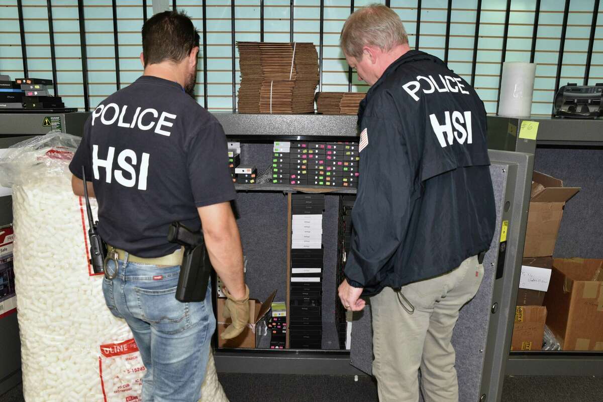 Authorities arrested three Houston-area individuals in connection to a laundering scheme while confiscating about 1,900 stolen electronic devices with an estimated value of $1.8 million.