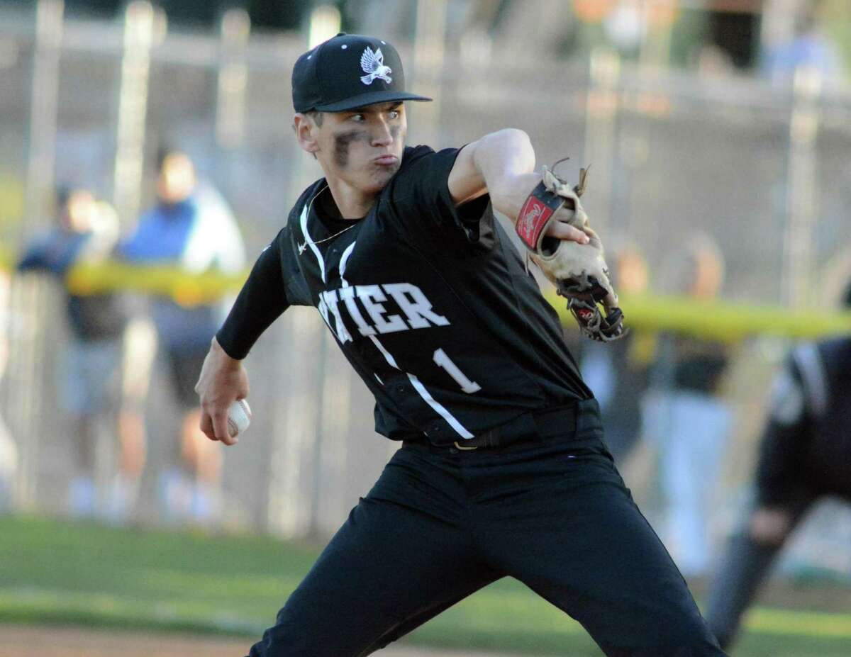 Tyler Hartley of Xavier throws a pitch in the first inning of a baseball game against Amity on Tuesday, April 17, 2022.