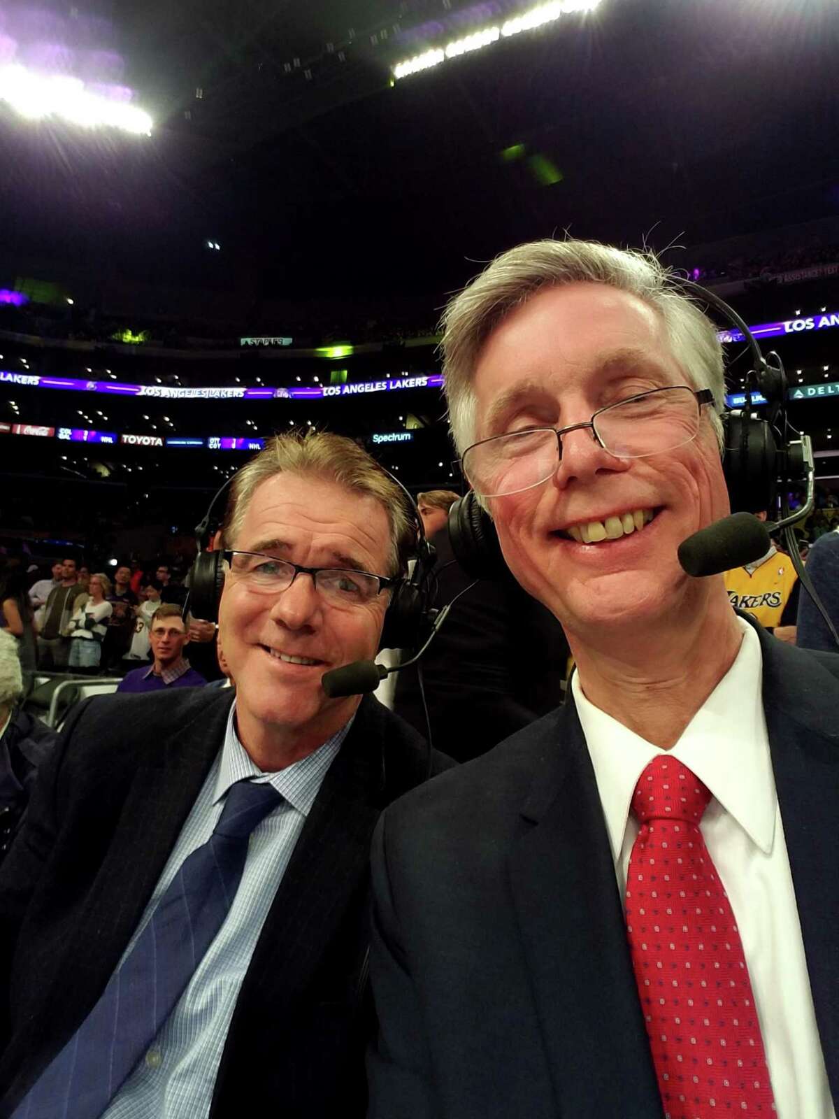 Bob Huessler and Tim Capstraw while working a Nets-Lakers game in Los Angeles.