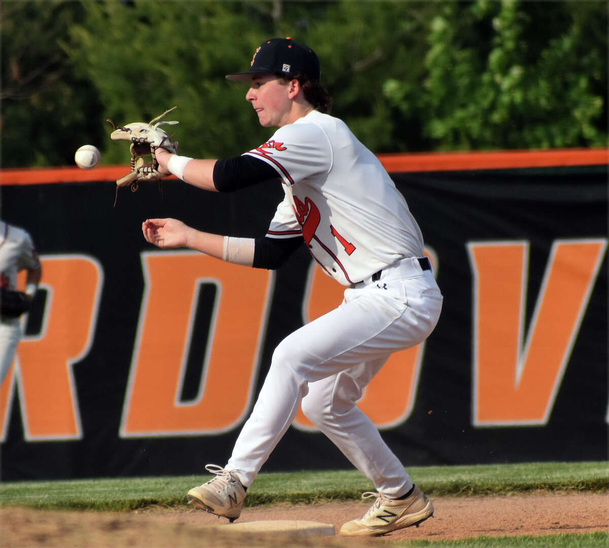Edwardsville's Cole Funkhouser catches a throw for a force at second against O'Fallon on Tuesday at Tom Pile Field in Edwardsville.