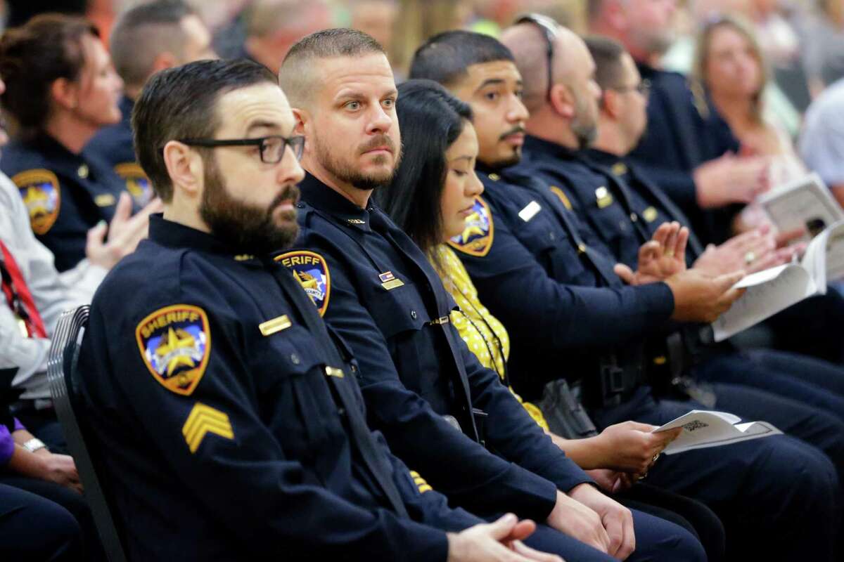 Some of the many award recipients wait for the program to begin during the annual Montgomery County Sheriffs Office Promotion, Recognition, and Award Ceremony held at The Lone Star Convention & Expo Center Tuesday, May 17, 2022 in Conroe, TX.