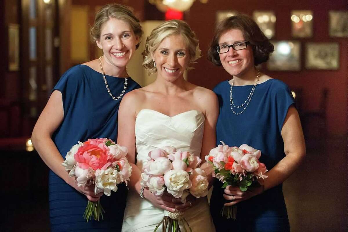 Lindsey Sablosky, right, with sisters Leah Drouin, left, and Andrea Billing.