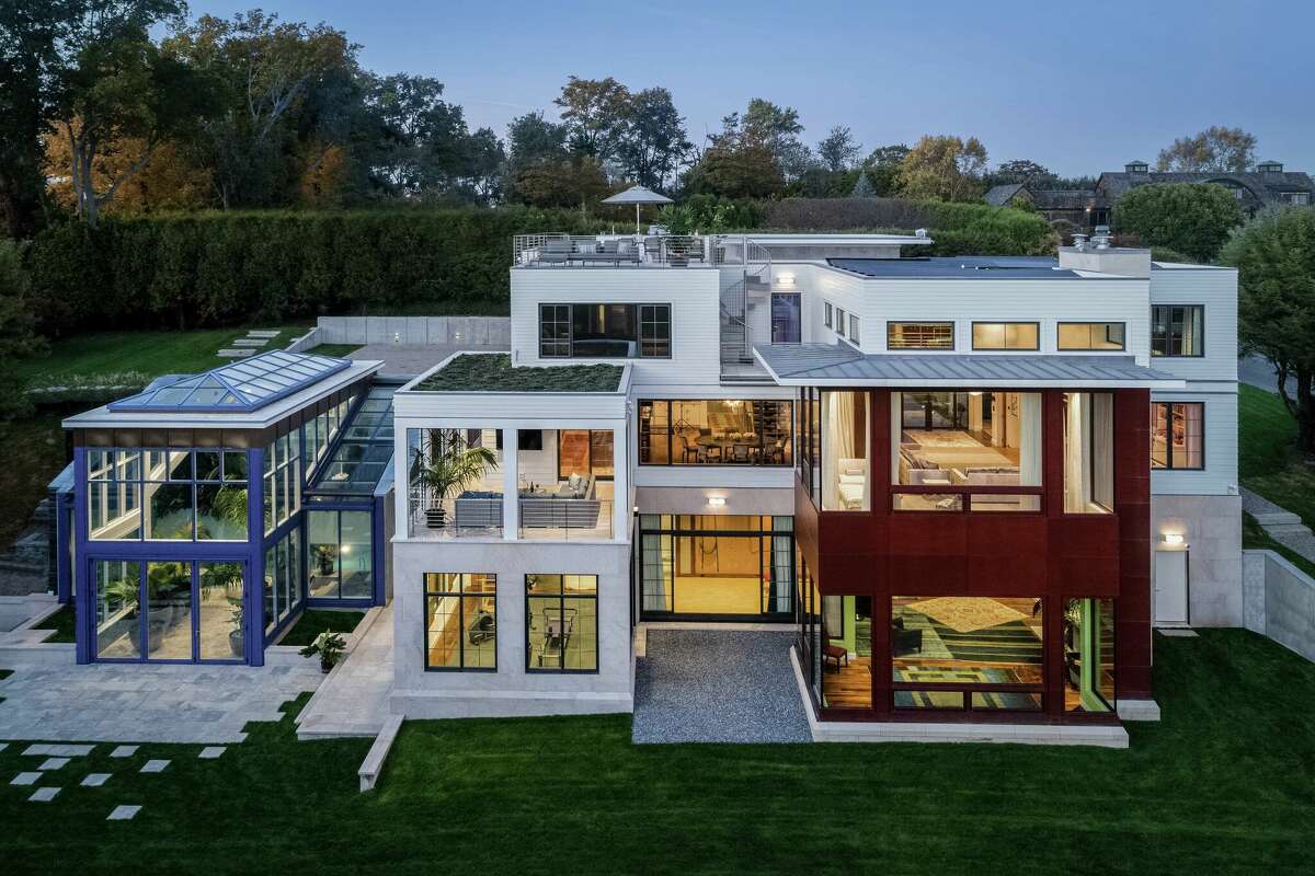 The home on 11 Bluewater Hill in Westport, Conn. is built like a "modern, glass fortress," according to co-listing agent Carrie Perkins. 