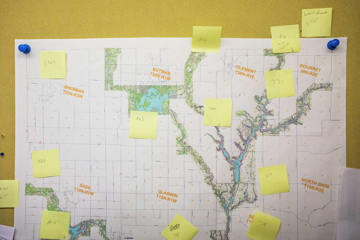 A map of Gladwin County is covered in post-it notes designating elevation levels Tuesday, May 17, 2022 at the county government offices in Gladwin.