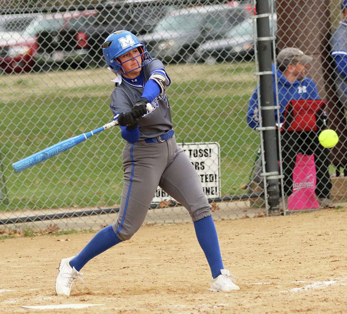 Marquette's Lauren Lenihan, shown getting a hit earlier this season at Moore Park, had homered and drove in five runs along with getting the win in the Explorers' 12-2 win over Columbia in a Class 2A regional semifinal in Alton.