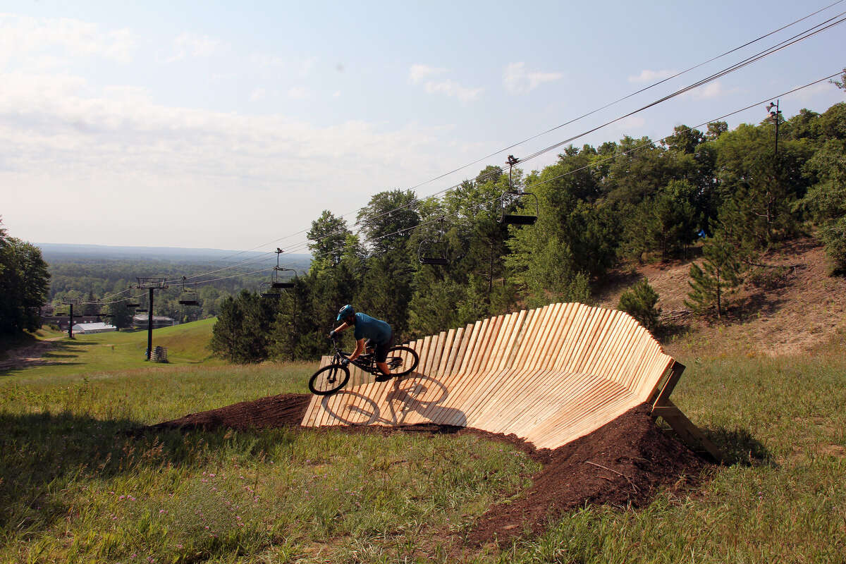 New downhill mountain bike trails are opening at Crystal Mountain's new bike park with a grand opening scheduled for Saturday. 