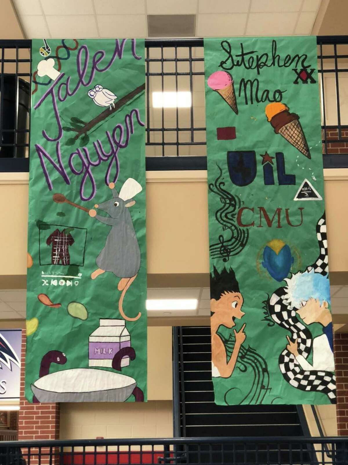Banners decorating the entrance hallway at Dawson High School were created by members of the school's student council to honor each of the Top 20-ranked graduating seniors.