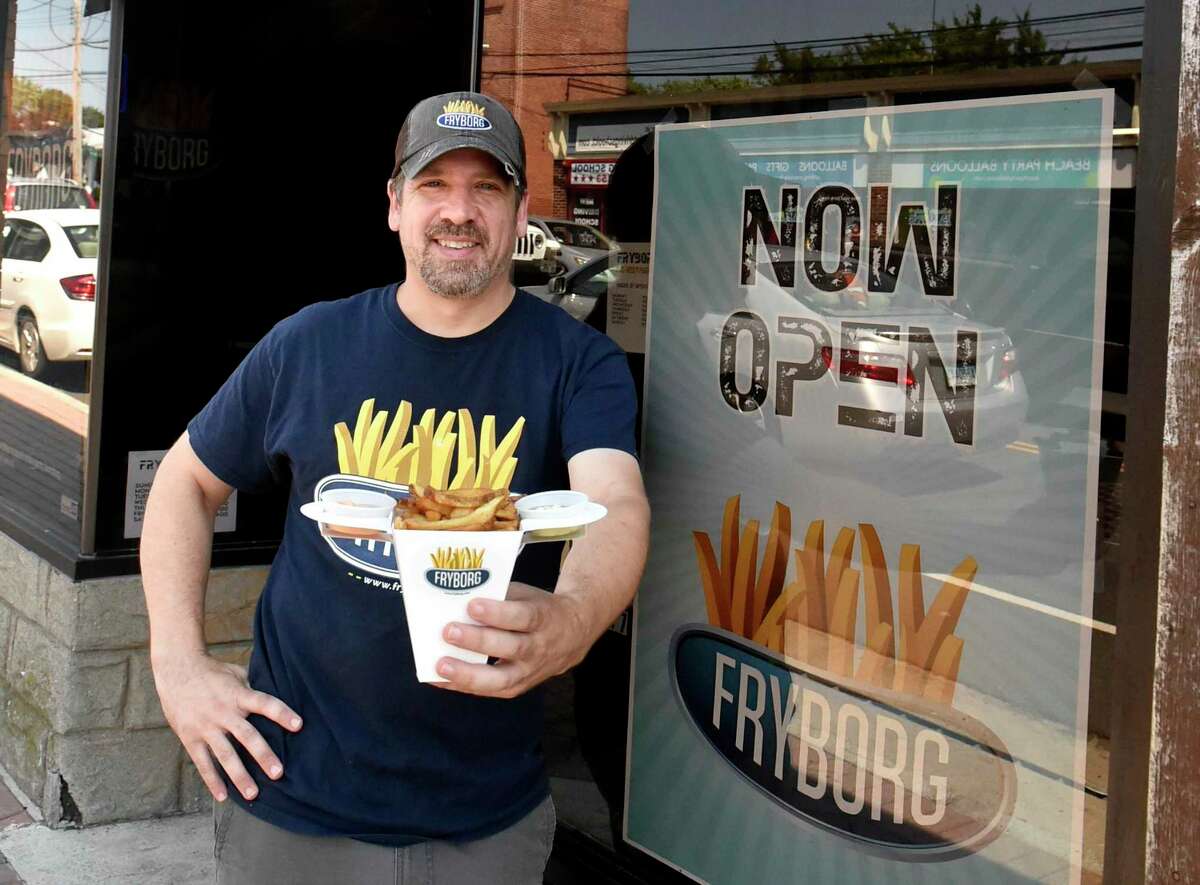 Jonathan Gibbons in front of his Fryborg restaurant on Bridgeport Ave. in Milford in 2018. Gibbons confirms his new location in Trumbull has been delayed, but he is now hoping for a late summer opening.