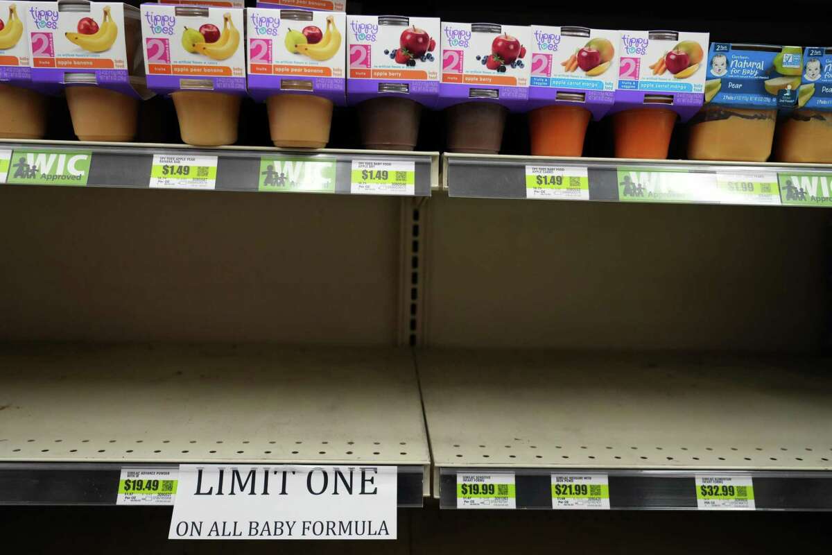 A sign in front of empty shelves notifies customers that they are allowed only one container of baby formula at a store in Provo, Utah, US, on Tuesday, May 17, 2022. President Joe Biden said he expects increased imports of baby formula to relieve a US shortage “in a matter of weeks or less,” as pressure mounts from parents and lawmakers to address the problem. Photographer: George Frey/Bloomberg