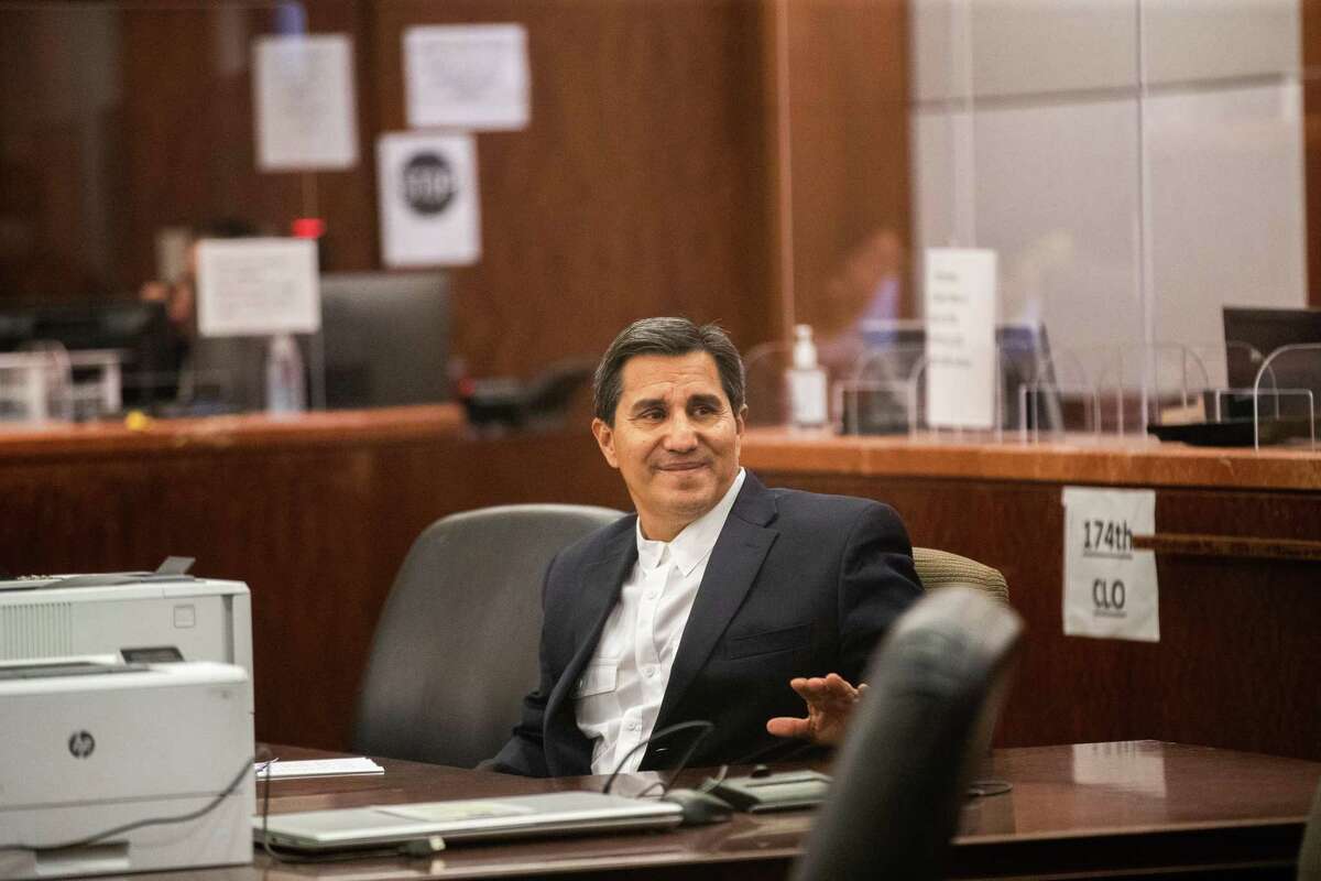 Charles Martinez acknowledges a person in the audience at the Harris County Criminal Courthouse 174th District Court, Wednesday, May 18, 2022, in Houston. Martinez is expected to be sentenced on Wednesday, in connection to a 2015 sexual assault of an intellectually disabled adult. Martinez was previously charged in 2001 out of Brazoria County for abuse at a ranch for troubled children.