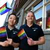 Blue Orchid owners Kyu Tipjak, left, and his husband, Michael Flora, are photographed outside of their restaurant on Court Street in New Haven,