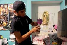 Jaret Anchondo prepares a bottle of formula for his 5 month old daughter, Rosali. Anchondo and his partner, Estefania Chapa have been having trouble finding their prescribed baby formula for Rosali, and have spent hours driving around the city looking for it.