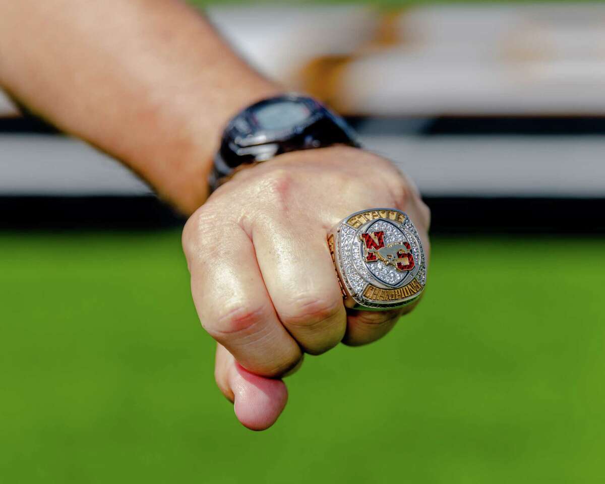 North Shore head football coach Jon Kay poses for pictures during 2021 State Championship rings during the North Shore Ring Ceremony, Wednesday, May 18, 2022, in Houston. (Juan DeLeon/Contributor)