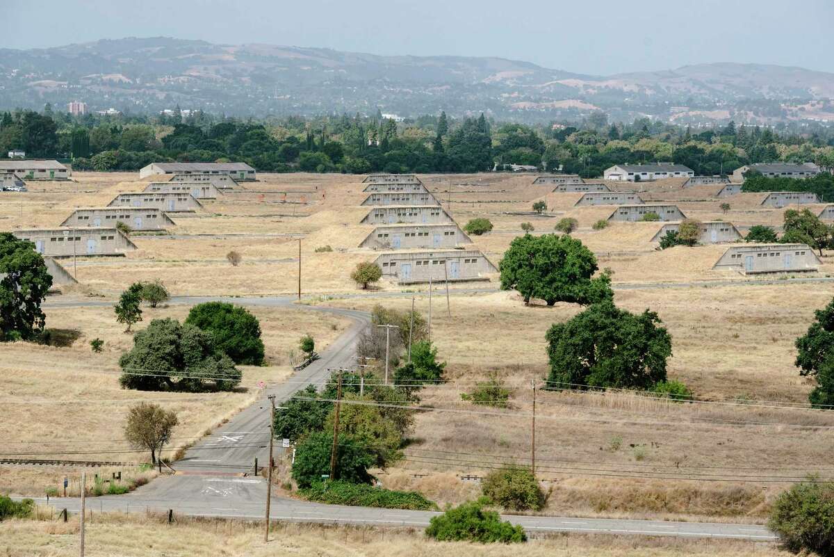 Former ammunition bunkers dot the landscape in “Bunker City,” at the Concord Naval Weapons Station in Concord, Calif., in 2019.