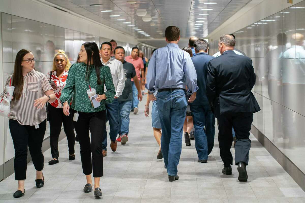 People walk through the downtown tunnels around lunchtime. Employees are still in the drivers seat as they seek flexibility, better pay and benefits, according to workplace experts.