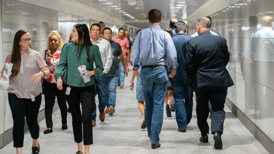 People walk through the downtown tunnels around lunchtime, Wednesday, May 4, 2022, in downtown Houston.