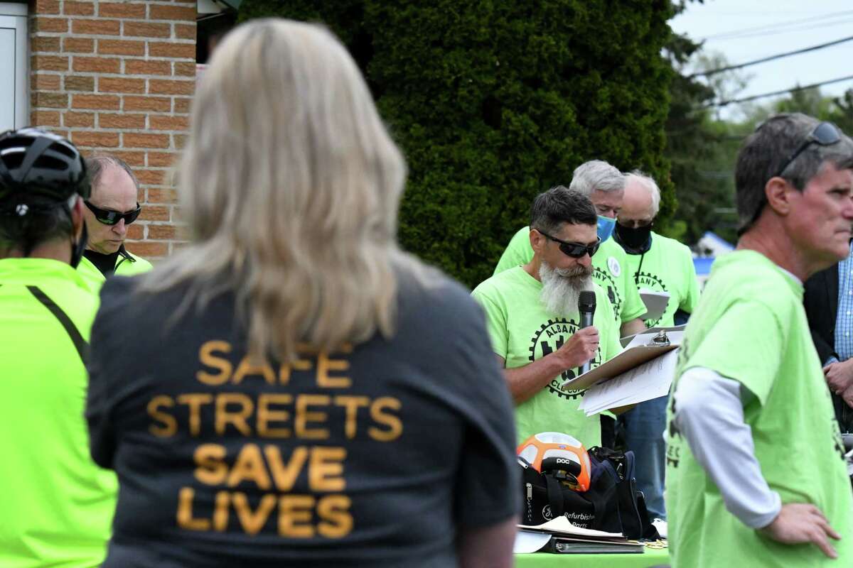 Albany Bike Coalition President Ed Brennan reads the names of cyclists and pedestrians who were killed by vehicles along Central Avenue on Wednesday, May 18, 2022, during a ghost bike at Pine Grove United Methodist Church in Colonie N.Y.
