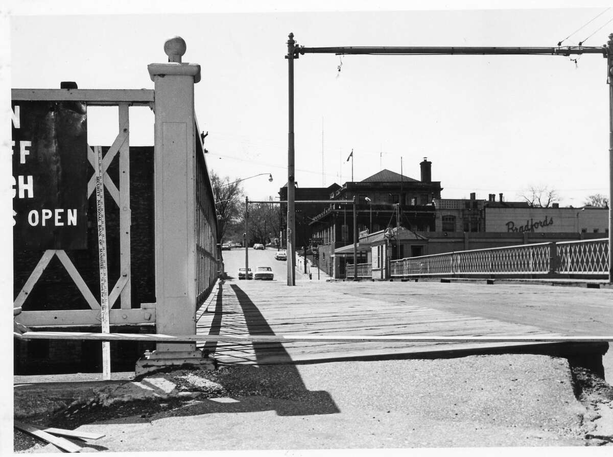 The approach to Maple Street Bridge is shown circa 1960.