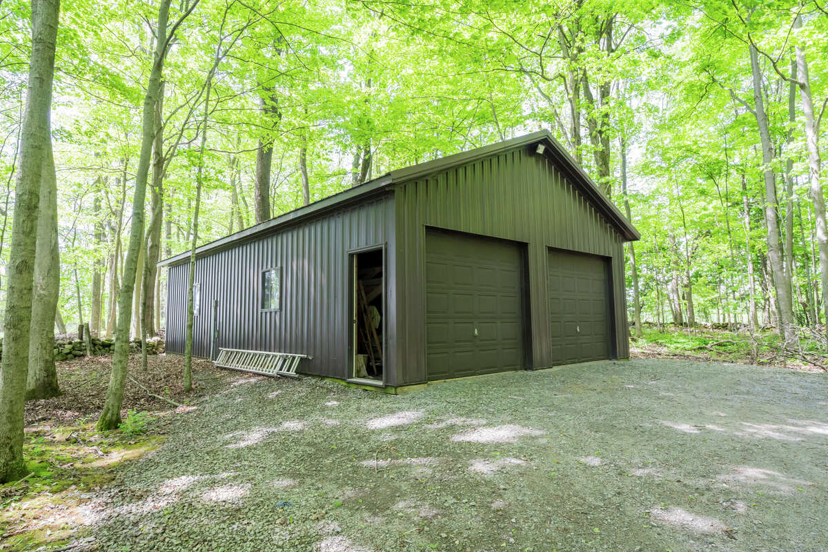 This modern contemporary home at 2270 Galway Road in Galway, Saratoga County, has three bedrooms, two full baths, and two half baths. It's listing price is $775,000.