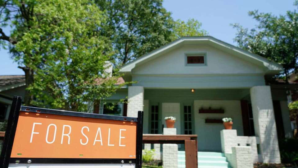 A for sale sign in shown outside a home in the Heights Monday, May 2, 2022, in Houston.