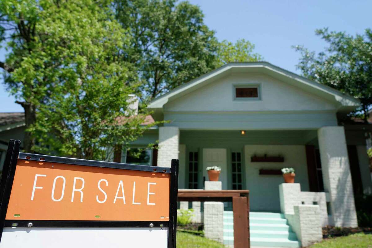 A for sale sign in shown outside a home in the Heights Monday, May 2, 2022, in Houston.