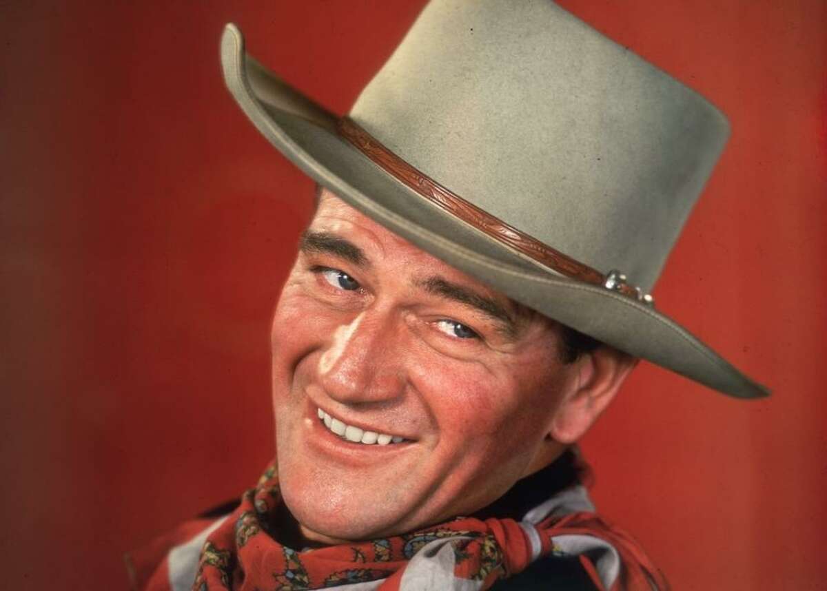 100 best John Wayne movies Before he was one of Hollywood’s most bankable and iconic Western movie stars, actor John Wayne was an Iowa-born USC lineman named Marion Morrison. Morrison lost his football scholarship due to a shoulder injury from a bodysurfing accident, and landed a job in 1927 as a prop guy on the Fox Studios lot. That gig didn’t last long, however, as it took just three years for Morrison to snag his first lead role in 1930’s “The Big Trail.” Not being fond of the name Marion Morrison, the movie’s producers instructed director Raoul Walsh to change it. Thus was John Wayne born. In honor of the Duke himself, Stacker ranked John Wayne’s 100 best movies from lowest to highest according to its IMDb rating, with ties broken by the number of votes. We focus on Wayne’s acting credits from his first starring role in 1930 and his breakout performance in 1939’s “Stagecoach” to his final star turn in 1976’s “The Shootist.” It’s worth noting that some of Wayne’s films don’t have too many user votes, but that’s largely because they were released in the first half of the 1900s, and for the first several years of his career he was making much smaller pictures that never received the sort of wide release a Wayne film demanded in the 1950s and 1960s—when he was the most popular movie star in America. The swaggering masculinity Wayne infused into characters bled off-screen and permeated American culture for decades with nostalgia for unencumbered male machismo and a sense of a man’s personal responsibility to be true to his own nature, popular opinion notwithstanding. By the time Wayne appeared in John Ford’s “3...