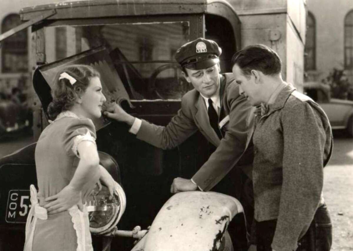 #100. California Straight Ahead! (1937) - Director: Arthur Lubin - IMDb user rating: 5.9 - Runtime: 67 minutes Seemingly cast off type, this film casts Wayne as a former school bus driver turned trucking company owner who puts his fleet to the test by competing with a specially outfitted train to deliver aviation parts to an ocean liner in advance of a looming labor strike. Universal produced and distributed the film—one of six Wayne made at the studio, none of them Westerns. Director Arthur Lubin also directed four other pictures on Wayne’s Universal contract.